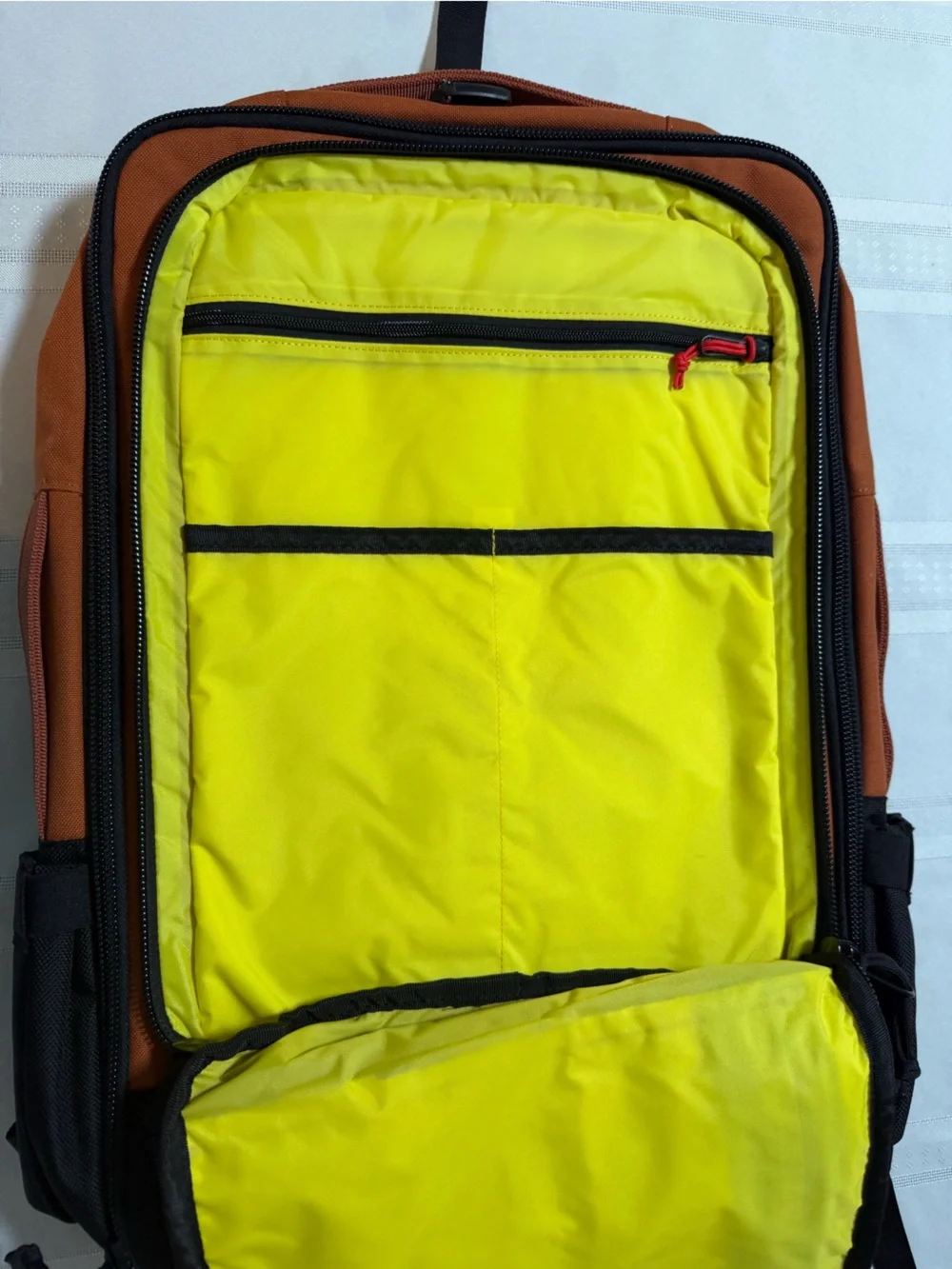 Topo Designs Orange and Black global travel bag 30L